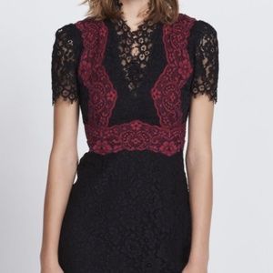 Sandro lace dress with red details